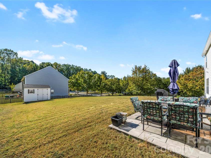 2602 Mullis Lane, Matthews, NC 28105.  MLS# CAR4436447, YatesRealty ID 57706. 