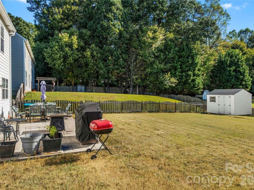 2602 Mullis Lane, Matthews, NC 28105.  MLS# CAR4436447, YatesRealty ID 57706. 
