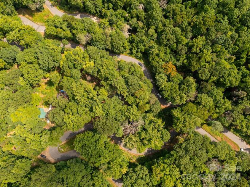 1563 Green River Cove Road, Saluda, NC 28773.  MLS# CAR4157583, YatesRealty ID 5771. View of property from above