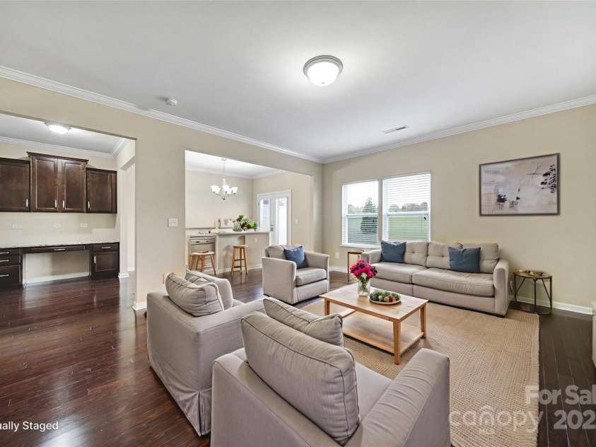 832 Summerlake Drive, Fort Mill, SC 29715.  MLS# CAR4298895, YatesRealty ID 5773. Staged great rm and dining rm