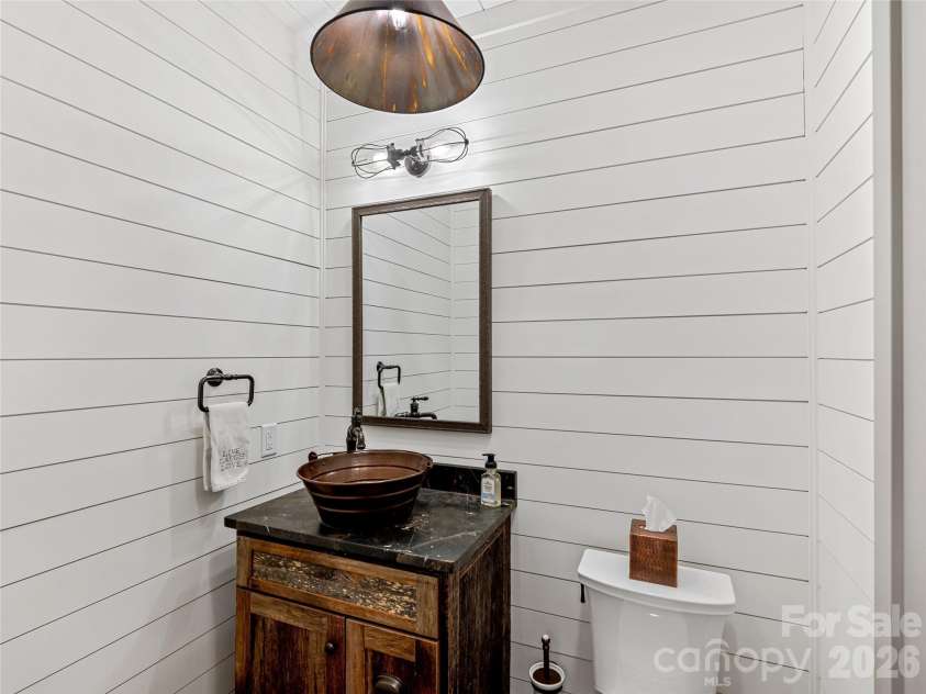 59 Bradford Hill Road, Mills River, NC 28759.  MLS# CAR4241459, YatesRealty ID 5774. Half bath on main