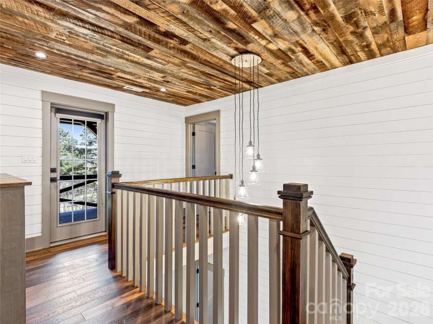 59 Bradford Hill Road, Mills River, NC 28759.  MLS# CAR4241459, YatesRealty ID 5774. Upper level with modern, rustic features - that ceiling though!