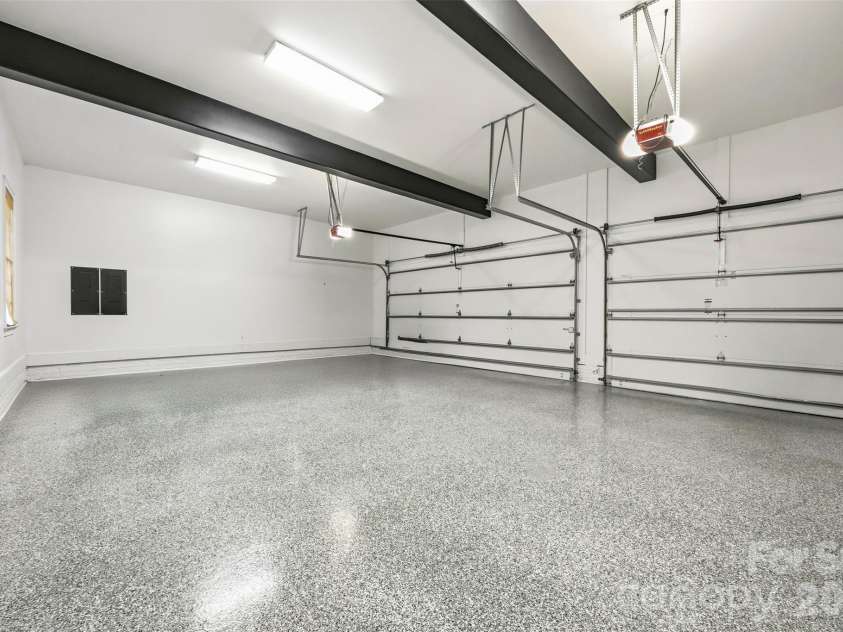 3236 Shillington Place, Charlotte, NC 28210.  MLS# CAR4435610, YatesRealty ID 57741. 3 car garage with epoxy floors