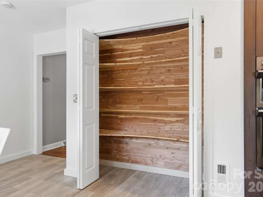 1200 Charter Place, Charlotte, NC 28211.  MLS# CAR4435182, YatesRealty ID 57748. Custom cedar kitchen pantry