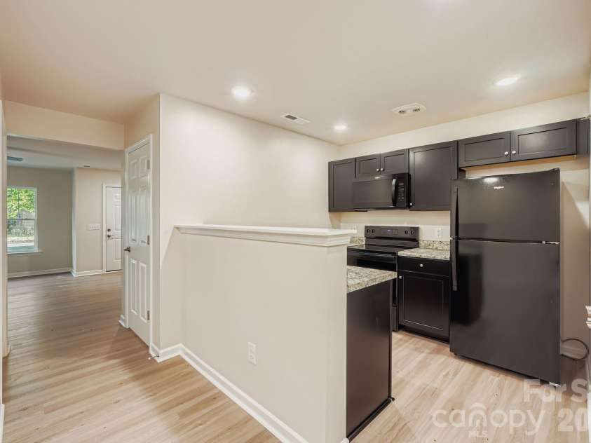 1765 J Julian Lane, Charlotte, NC 28208.  MLS# CAR4429313, YatesRealty ID 57757. 