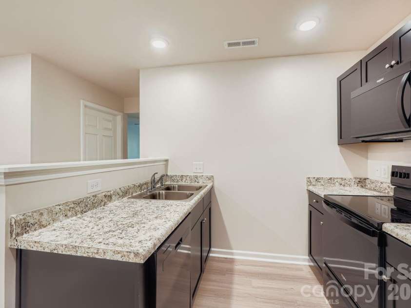 1765 J Julian Lane, Charlotte, NC 28208.  MLS# CAR4429313, YatesRealty ID 57757. 
