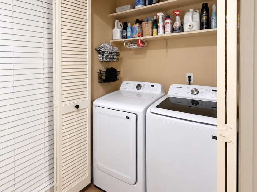11101 Sevilla Court, Charlotte, NC 28226.  MLS# CAR4427572, YatesRealty ID 57761. Laundry Closet in the Kitchen
