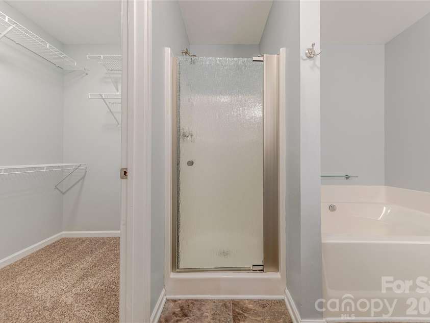 2147 Midnight Blue Lane, Fort Mill, SC 29708.  MLS# CAR4340117, YatesRealty ID 5778. Glass Enclosed Shower