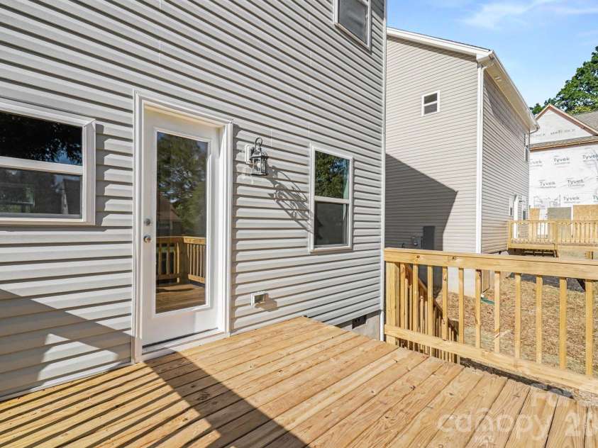 125 Buffalo Avenue, Concord, NC 28025.  MLS# CAR4436438, YatesRealty ID 57809. Back door entrance from deck.