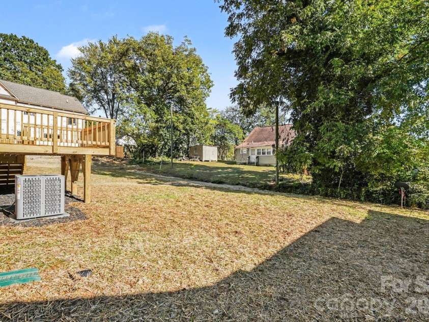 125 Buffalo Avenue, Concord, NC 28025.  MLS# CAR4436438, YatesRealty ID 57809. Back yard view.