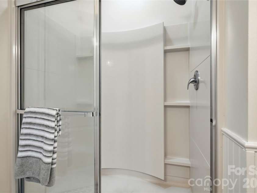 16918 Summers Walk Boulevard, Davidson, NC 28036.  MLS# CAR4436252, YatesRealty ID 57810. Primary bath features walk-in shower