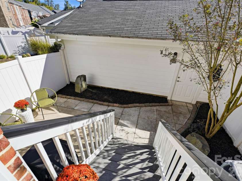 16918 Summers Walk Boulevard, Davidson, NC 28036.  MLS# CAR4436252, YatesRealty ID 57810. Stairs to patio and garage