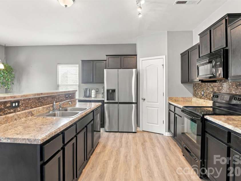 11228 Deer Chase Lane, Charlotte, NC 28262.  MLS# CAR4432965, YatesRealty ID 57819. 