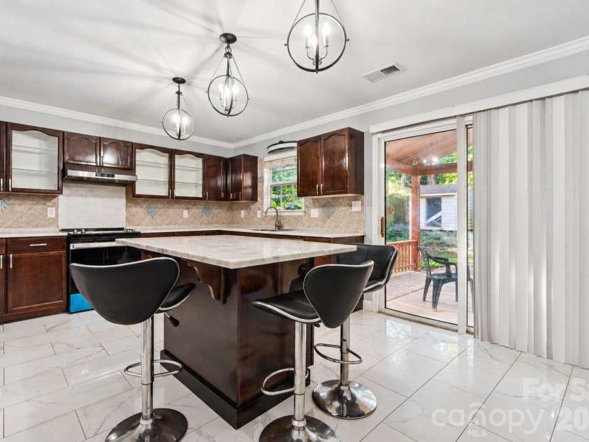 5142 Grays Ridge Drive, Charlotte, NC 28269.  MLS# CAR4429698, YatesRealty ID 57853. 