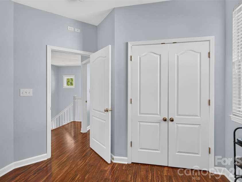 19910 Madison Village Drive, Cornelius, NC 28031.  MLS# CAR4436532, YatesRealty ID 57858. Front Bedroom