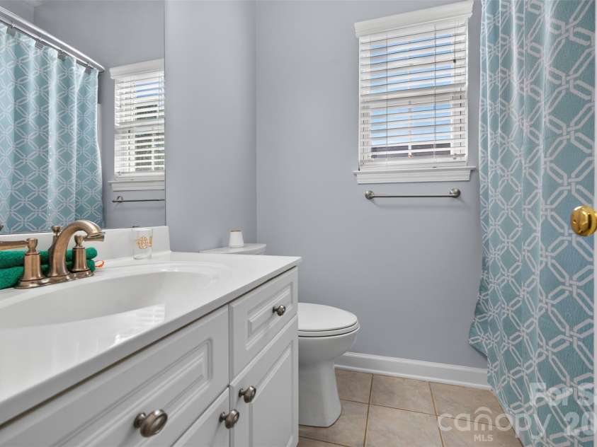 19910 Madison Village Drive, Cornelius, NC 28031.  MLS# CAR4436532, YatesRealty ID 57858. Upstairs hall Bath