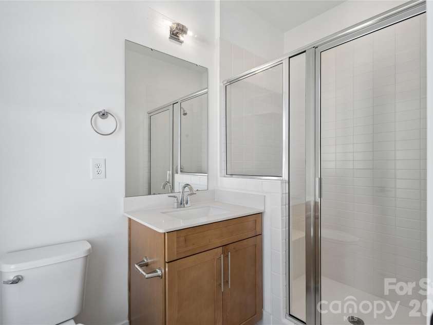 4058 Sophia Drive, Charlotte, NC 28217.  MLS# CAR4436788, YatesRealty ID 57861. Second bathroom*representative photo