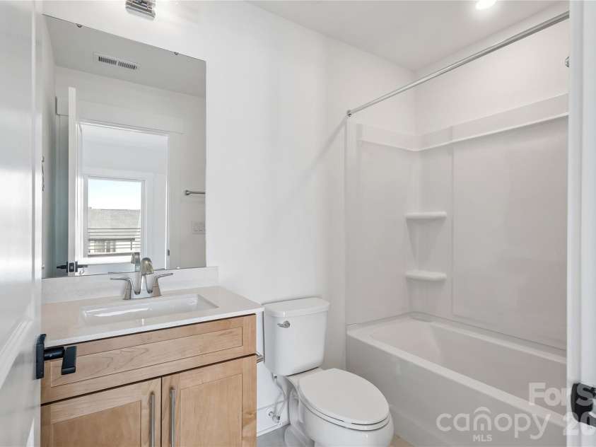 4058 Sophia Drive, Charlotte, NC 28217.  MLS# CAR4436788, YatesRealty ID 57861. Third bathroom*representative photo