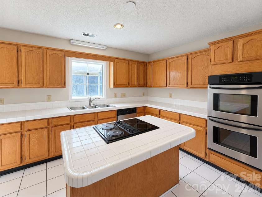 5244 Dayan Drive, Charlotte, NC 28216.  MLS# CAR4436890, YatesRealty ID 57898. 