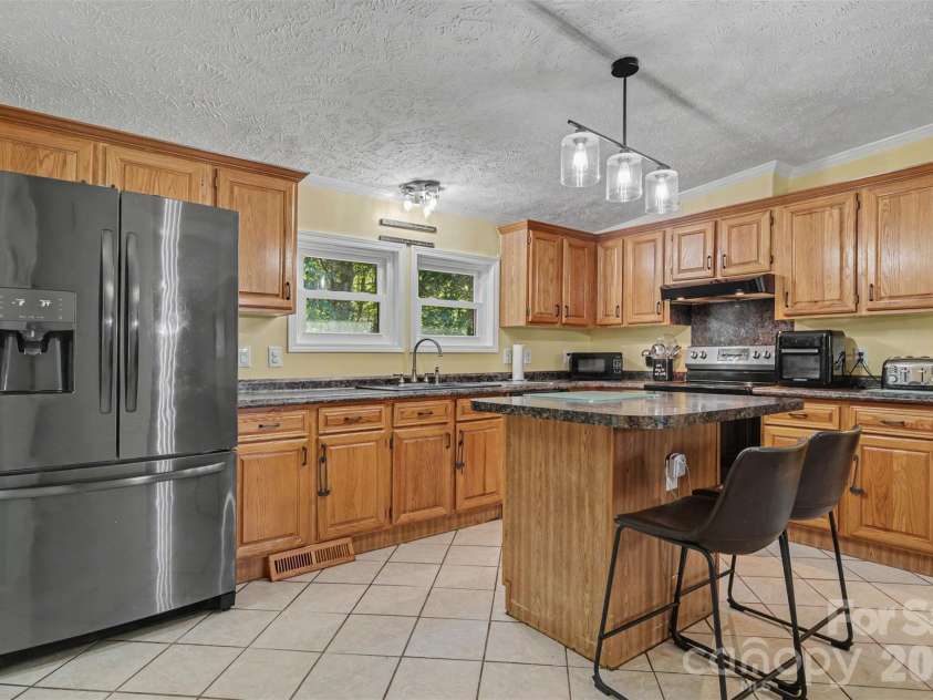 5821 Hidden Oaks Lane, Clover, SC 29710.  MLS# CAR4435769, YatesRealty ID 57899. 