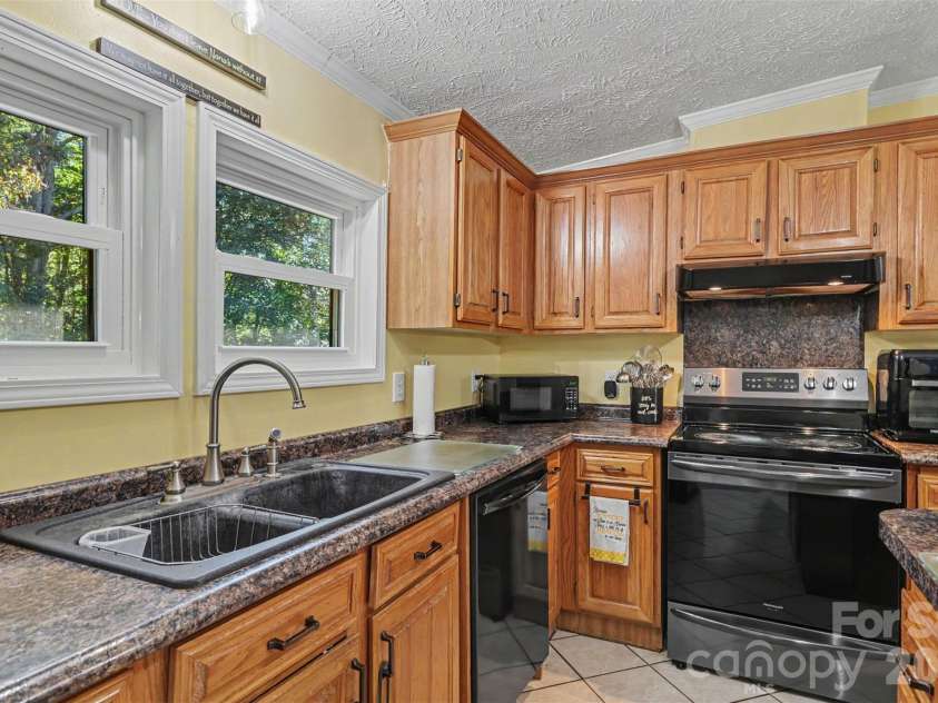 5821 Hidden Oaks Lane, Clover, SC 29710.  MLS# CAR4435769, YatesRealty ID 57899. 