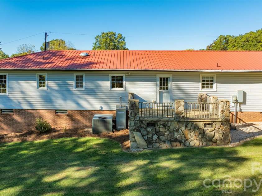 149 Seeley Drive, Denton, NC 27239.  MLS# CAR4435316, YatesRealty ID 57904. Back deck