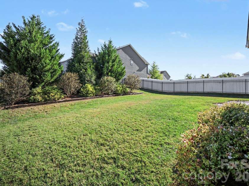 4410 Huntley Glen Drive, Pineville, NC 28134.  MLS# CAR4436263, YatesRealty ID 57919. Backyard