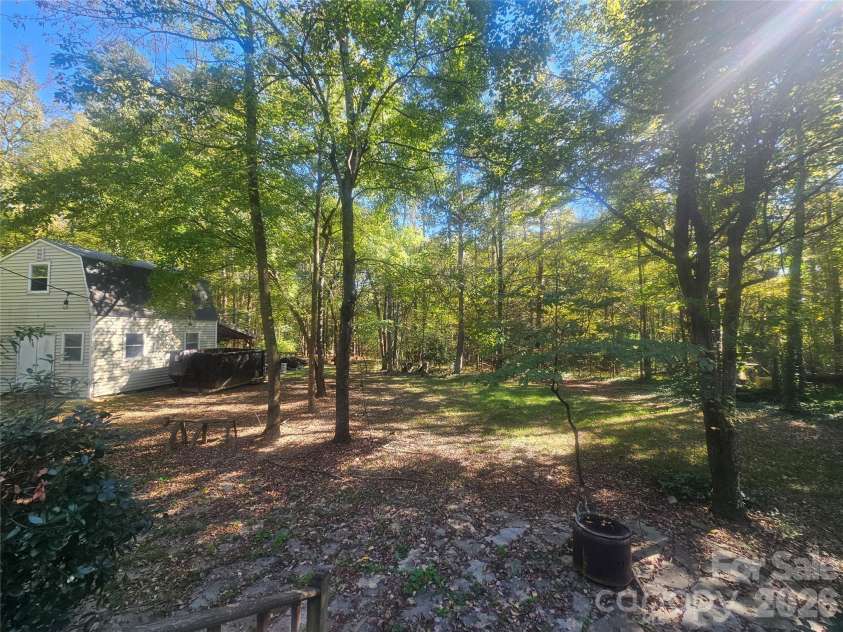 7313 Veranda Drive, Waxhaw, NC 28173.  MLS# CAR4436224, YatesRealty ID 57923. 2.83 acres with workshop