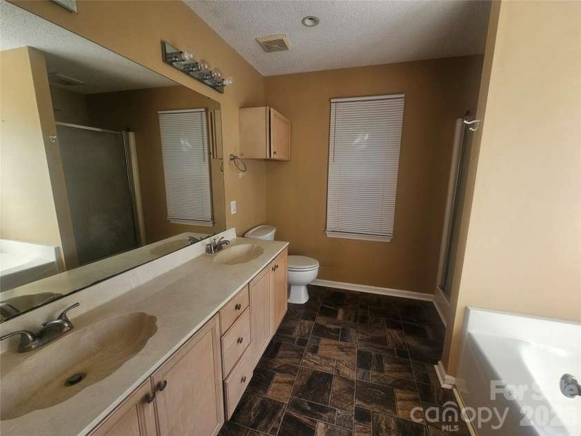 7313 Veranda Drive, Waxhaw, NC 28173.  MLS# CAR4436224, YatesRealty ID 57923. Primary Bath with double sinks