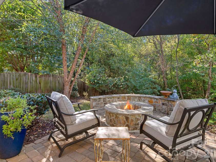 13326 Pierre Reverdy Drive, Davidson, NC 28036.  MLS# CAR4435596, YatesRealty ID 57935. Patio with Firepit overlooking private backyard