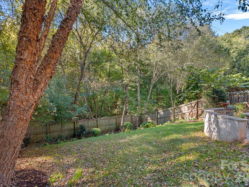 13326 Pierre Reverdy Drive, Davidson, NC 28036.  MLS# CAR4435596, YatesRealty ID 57935. Private backyard backs up to a nature trail