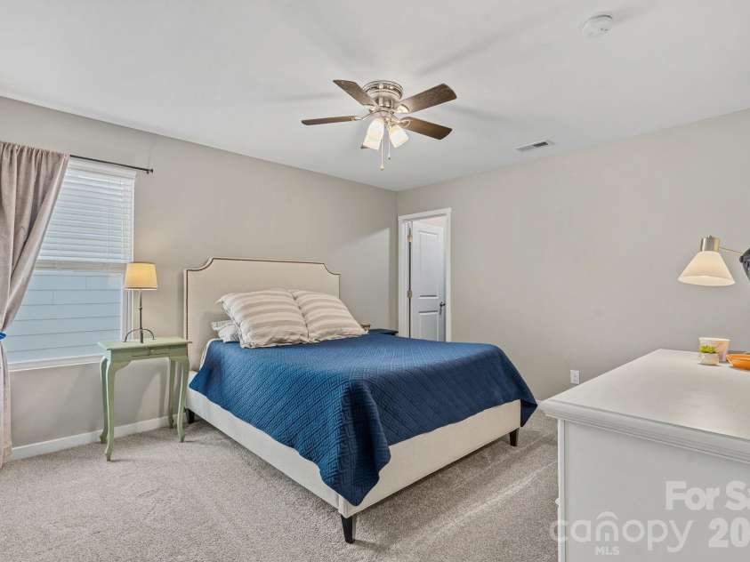 13326 Pierre Reverdy Drive, Davidson, NC 28036.  MLS# CAR4435596, YatesRealty ID 57935. Spacious Middle Bedroom 2