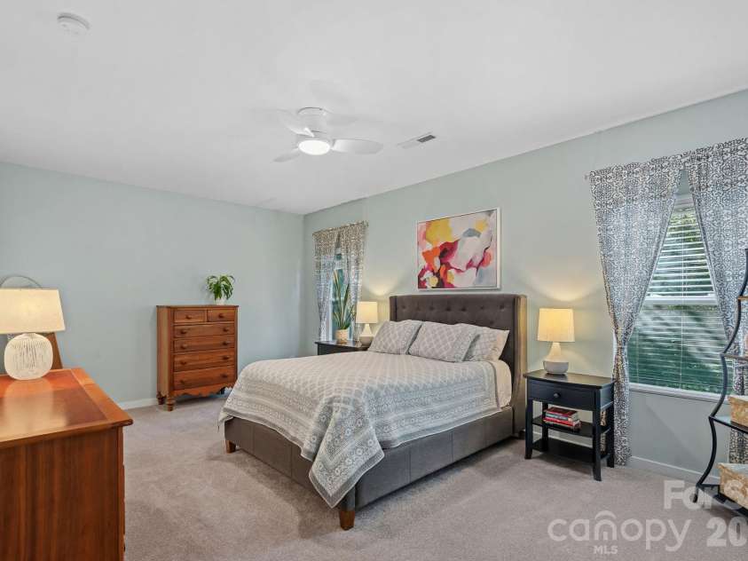 13326 Pierre Reverdy Drive, Davidson, NC 28036.  MLS# CAR4435596, YatesRealty ID 57935. Spacious Primary Bedroom on Main Floor at rear