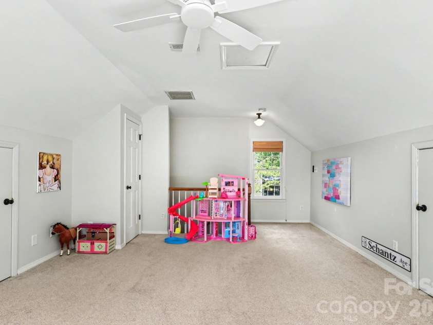 5515 McCallum Court, Charlotte, NC 28226.  MLS# CAR4435446, YatesRealty ID 57940. Playroom above the garage, inside separate steps