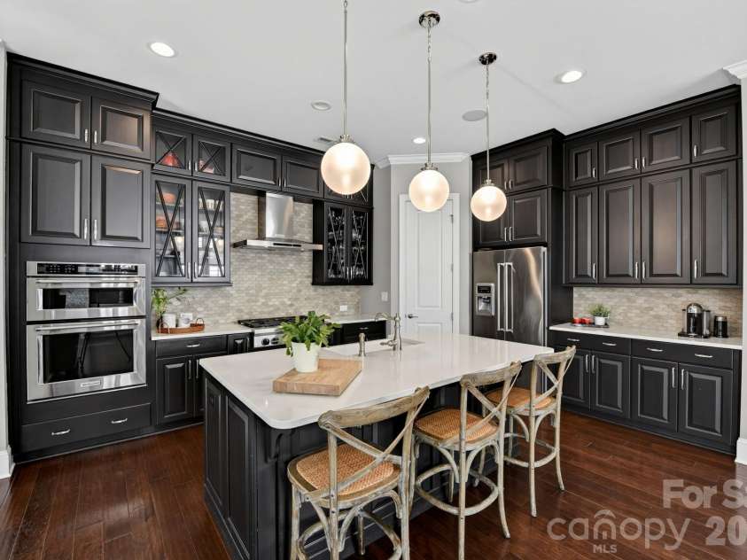 13013 Jacks Lane, Pineville, NC 28134.  MLS# CAR4435219, YatesRealty ID 57946. Kitchen CABINETRY EXTENDING TO THE CEILING