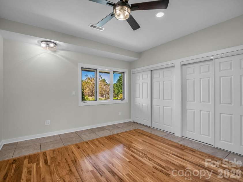 401 Over Hill Drive, Tryon, NC 28782.  MLS# CAR4434986, YatesRealty ID 57947. Second Bedroom - Split plan, double closet