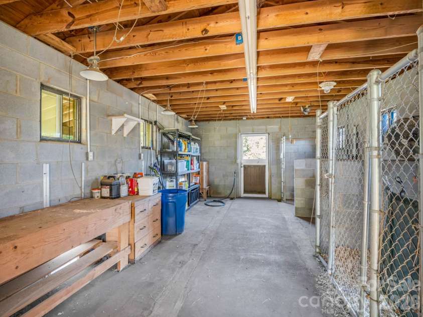 401 Over Hill Drive, Tryon, NC 28782.  MLS# CAR4434986, YatesRealty ID 57947. Workshop Interior