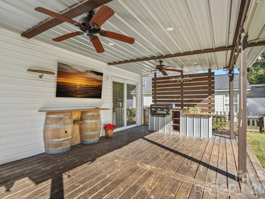 130 Camforth Drive, Mooresville, NC 28117.  MLS# CAR4434700, YatesRealty ID 57951. Back patio