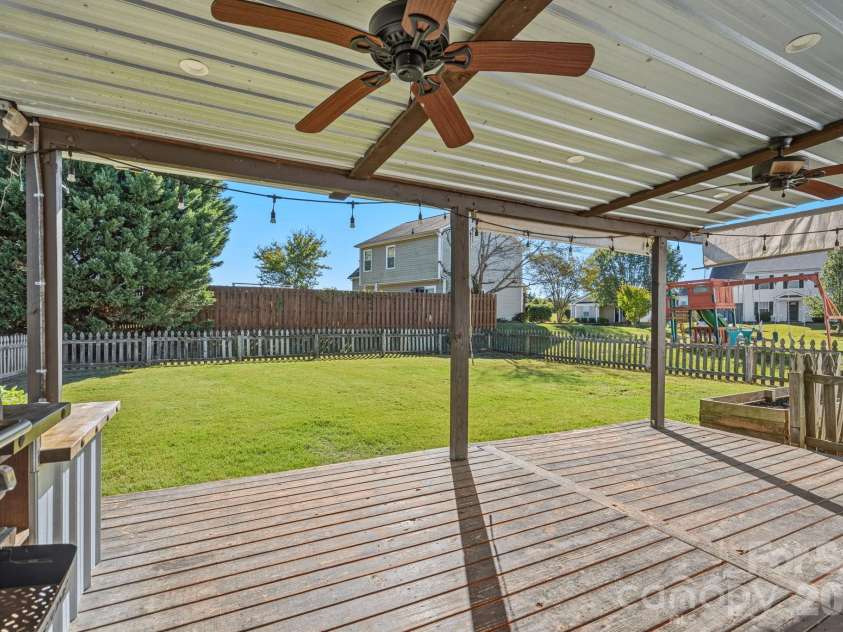 130 Camforth Drive, Mooresville, NC 28117.  MLS# CAR4434700, YatesRealty ID 57951. Back patio-covered