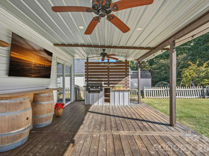 130 Camforth Drive, Mooresville, NC 28117.  MLS# CAR4434700, YatesRealty ID 57951. Back patio with Blackstone & grill