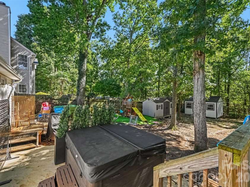 129 Shade Tree Circle, Fort Mill, SC 29715.  MLS# CAR4434473, YatesRealty ID 57954. Patio added with newer hot tub that conveys