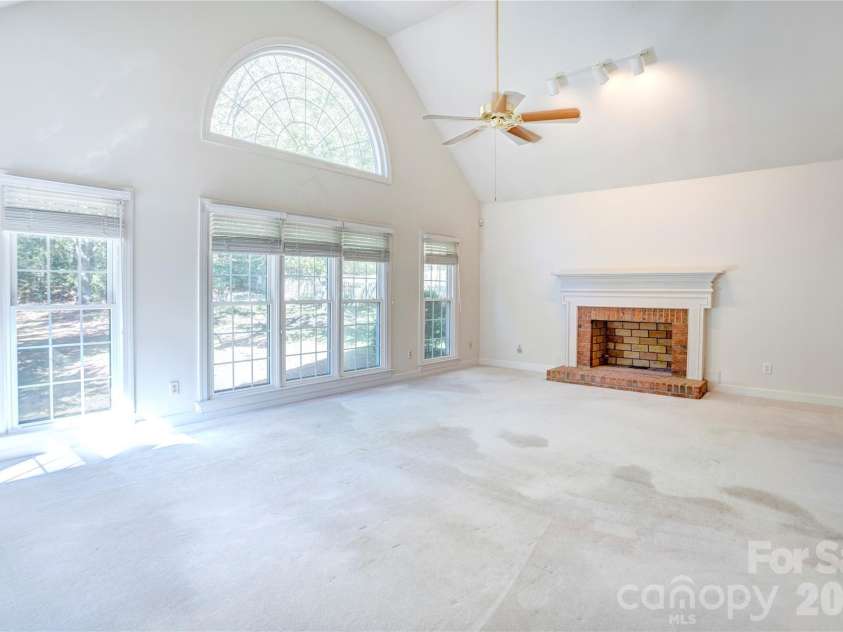 890 Lyerly Ridge Road, Concord, NC 28027.  MLS# CAR4433106, YatesRealty ID 57964. Large great room with soaring ceilings and fireplace