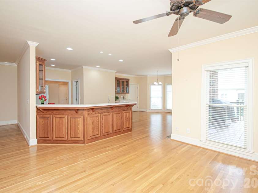 5480 Glen Forest Drive, Charlotte, NC 28226.  MLS# CAR4420356, YatesRealty ID 57976. SITTING/OFFICE or FLEX by Kitchen 14'x20': ceiling fan is also pre wired for a ceiling light. Customable area for your family needs.