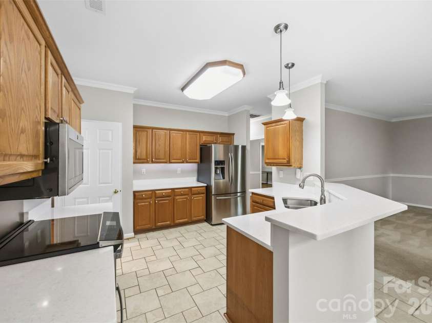 9014 Pickering Grove Lane, Charlotte, NC 28216.  MLS# CAR4420257, YatesRealty ID 57977. 