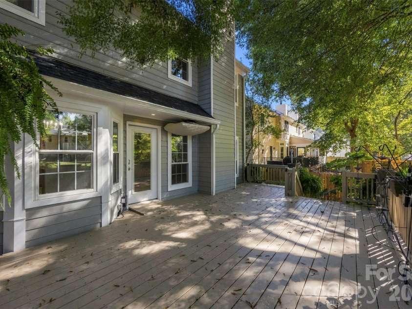9014 Pickering Grove Lane, Charlotte, NC 28216.  MLS# CAR4420257, YatesRealty ID 57977. Freshly painted deck