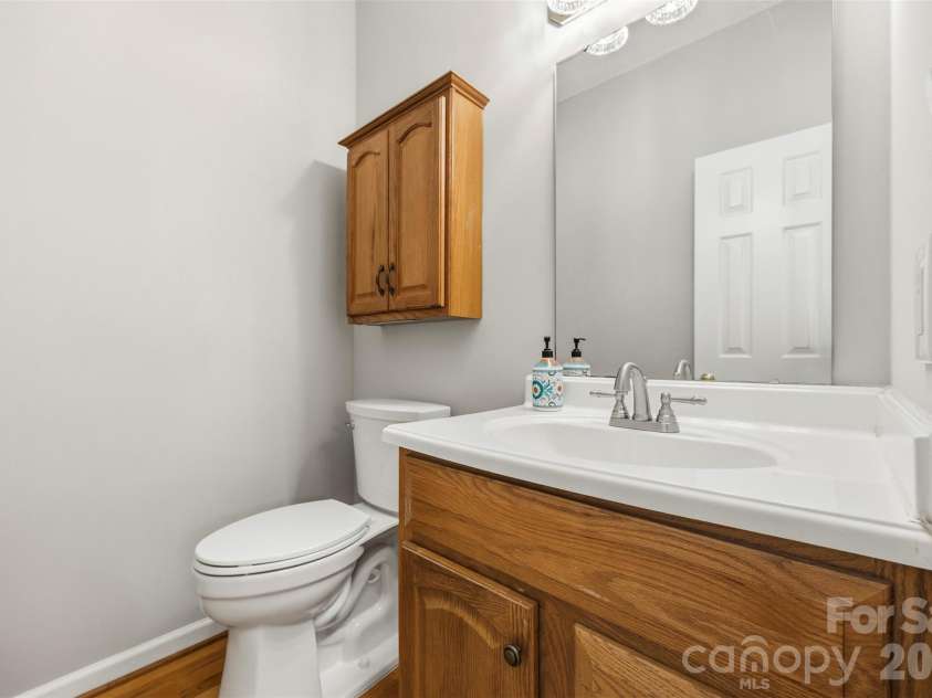9014 Pickering Grove Lane, Charlotte, NC 28216.  MLS# CAR4420257, YatesRealty ID 57977. Half bathroom