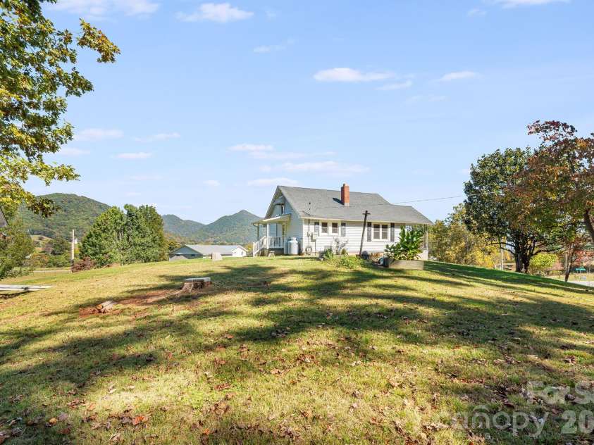 39 Brown Cove Road, Clyde, NC 28721.  MLS# CAR4433477, YatesRealty ID 57984. Back yard