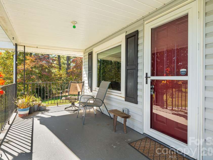 39 Brown Cove Road, Clyde, NC 28721.  MLS# CAR4433477, YatesRealty ID 57984. Front porch