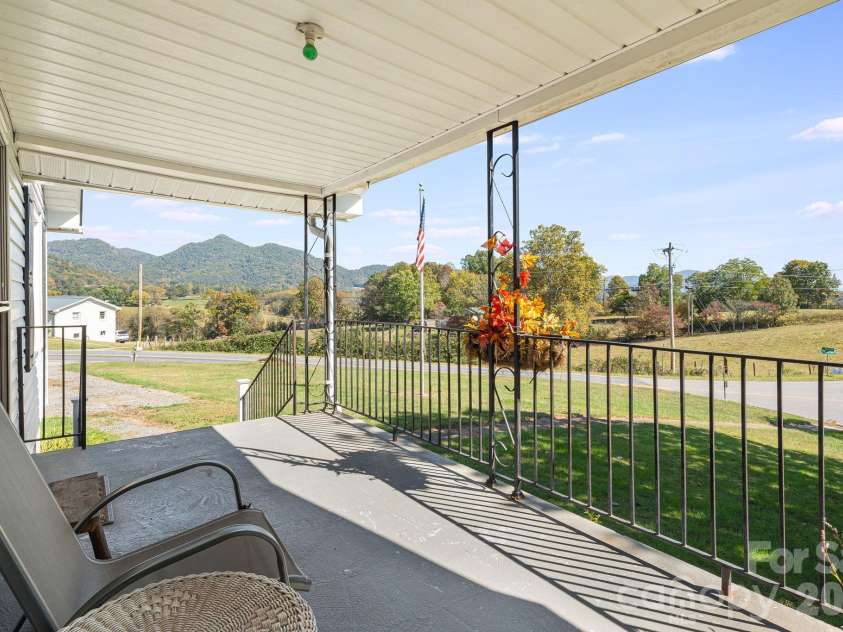 39 Brown Cove Road, Clyde, NC 28721.  MLS# CAR4433477, YatesRealty ID 57984. Front porch views