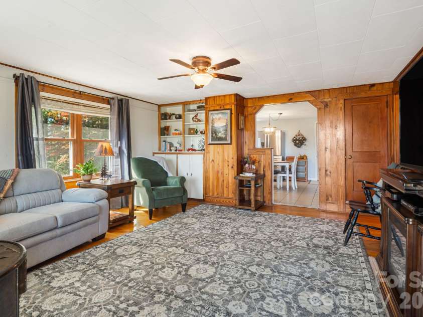 39 Brown Cove Road, Clyde, NC 28721.  MLS# CAR4433477, YatesRealty ID 57984. Living room
